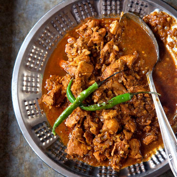 Vindaloos are characterized by a thinner, typically tangier sauce made with a splash of vinegar. These dishes also typically tend to be on the spicier side with a blend of hot chilies in the mix, so proceed with caution.Try making it at home with the recipe here.