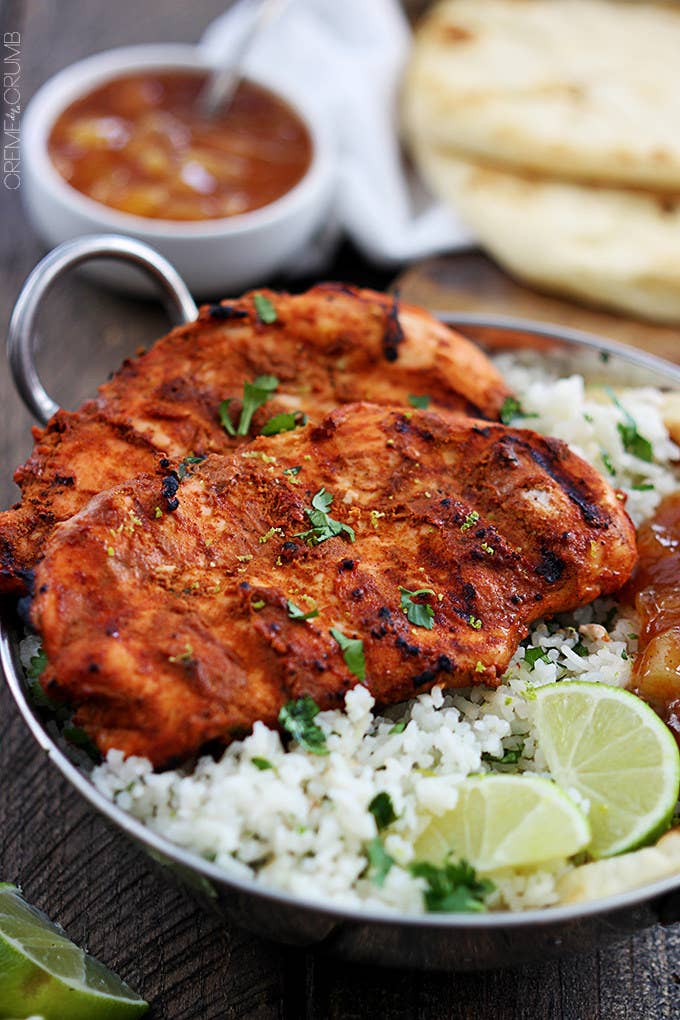 Traditionally, tandoori chicken is roasted in a clay oven called a tandoor. The chicken is marinated in yogurt and spices overnight before it goes in the tandoor on long skewers. If your kitchen or takeout spot doesn't have a clay oven, a grill or broiler will do the trick.Try making it at home with the recipe here.