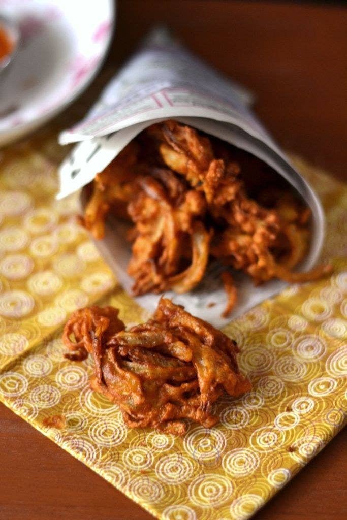 Pakora and bhaji are two terms for vegetables that are battered and deep fried, kind of like tempura. Onion is one of the most popular varieties of pakora and bhaji, but other vegetables are prepared the same way. That's a pretty convincing way to get your 3-5 a day.Try making it at home with the recipe here.