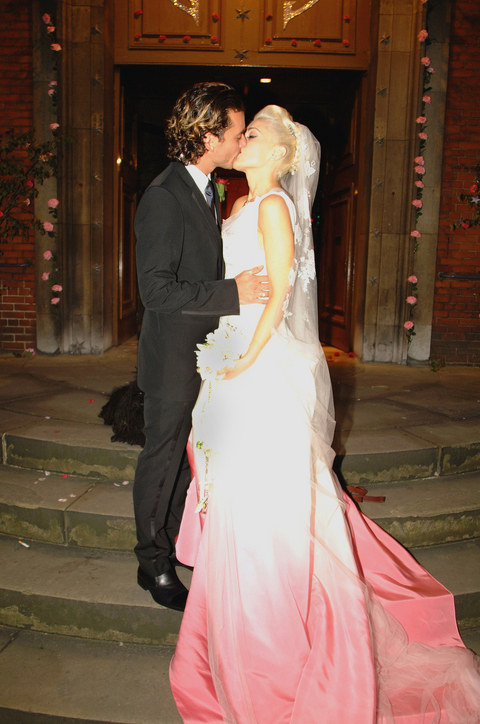 Gavin Rossdale and Gwen Stefani wed in September 2002, in London. Gwen wore a custom ombre John Galliano for Dior wedding gown.
