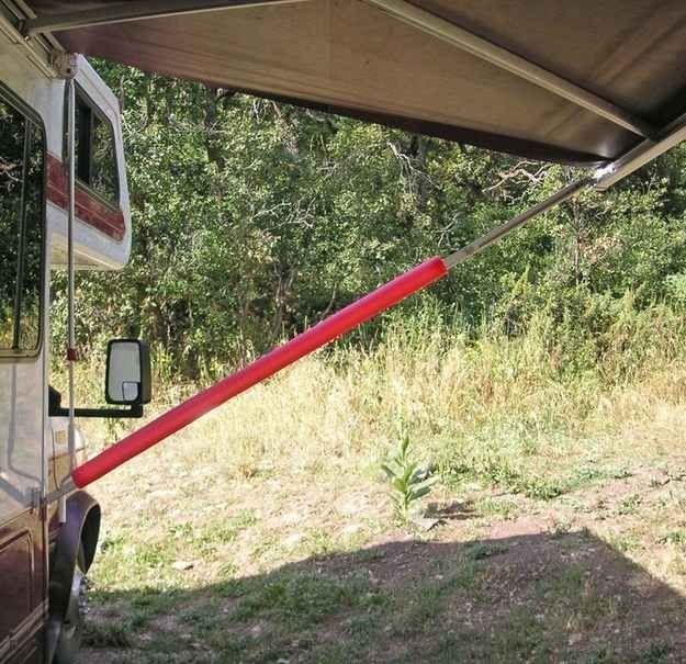 An awning strut covered with a pool noodle