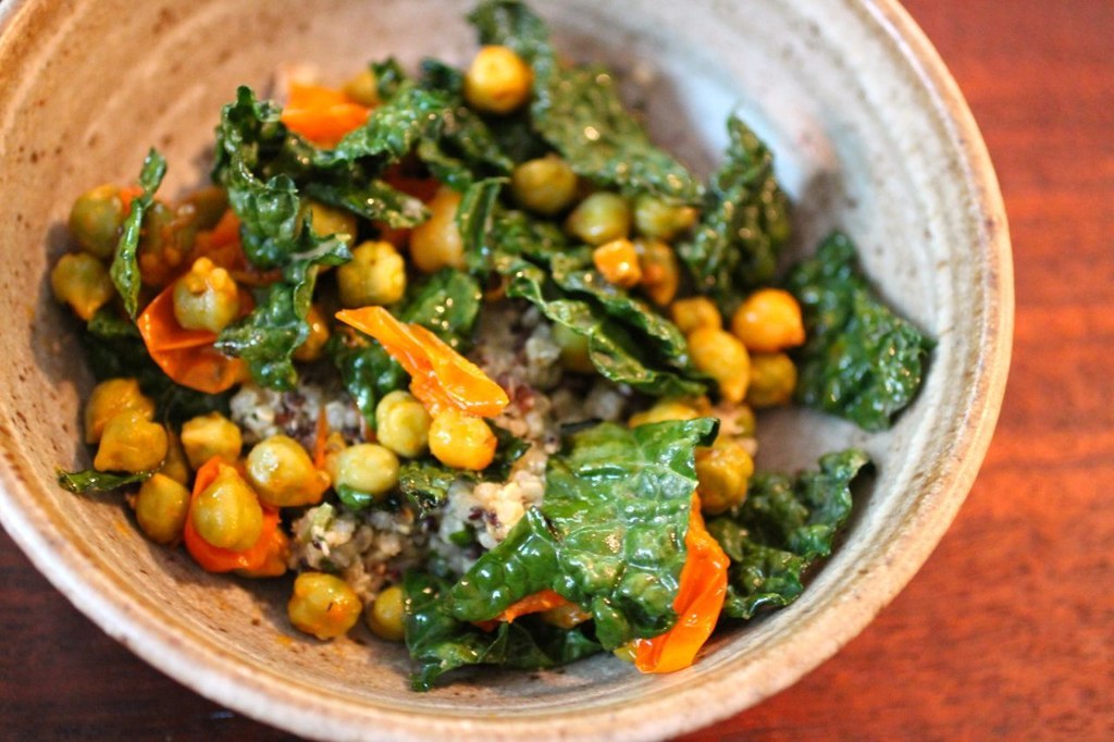 Chickpeas + quinoa + kale + tomatoes + spices. (Optional: Add pesto.) Get the recipe here.