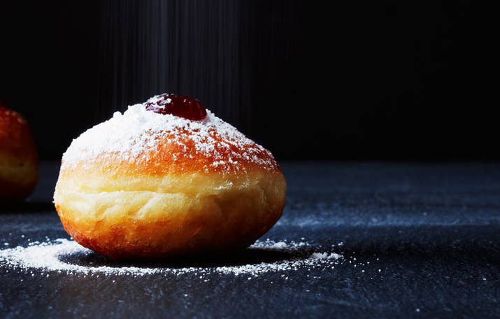 Potatoes aren't the only thing Jewish people deep fry on Hanukkah! In Israel, sufganiyot, which are basically just crazy good jelly doughnuts, are way more popular. They're not the easiest thing to make, but dang, the effort is WORTH IT. Step-by-step slideshow available here. Just the recipe here.