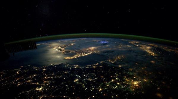"#Italy, lone #lightning strike, moonlight on the Med. #Perfection," the astronaut wrote.