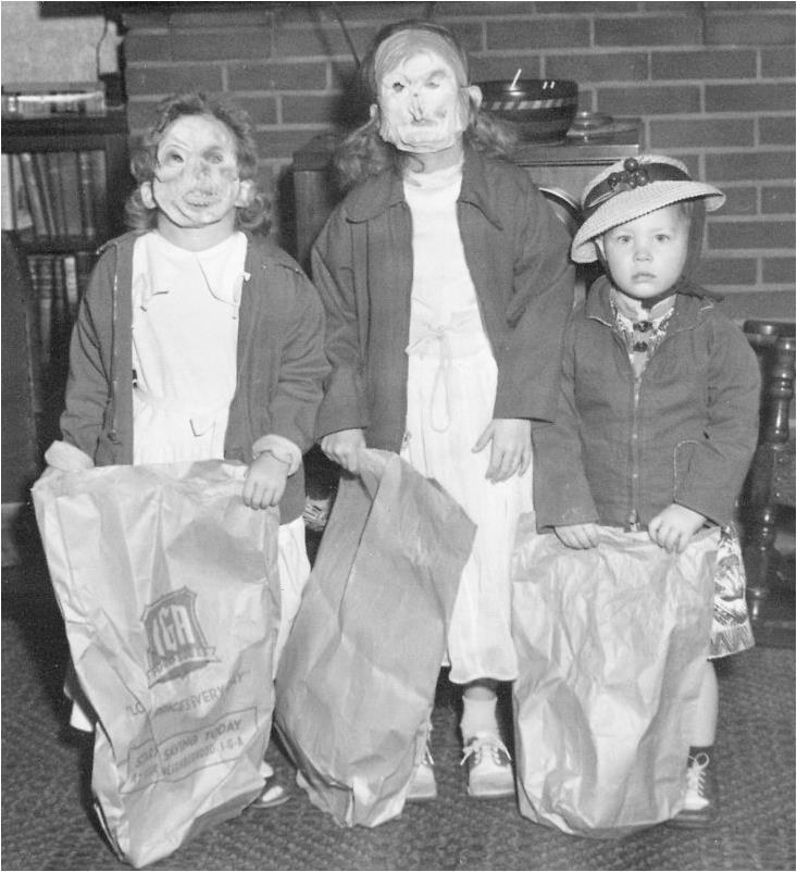 Cute as a button?! Little Betty-Lou (on the right) always felt the odd one out in the family.