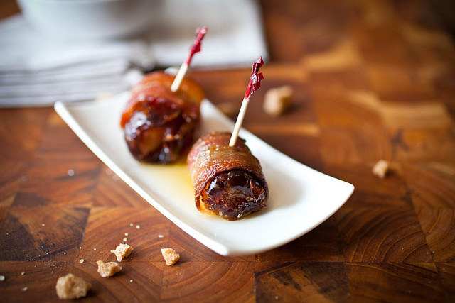 No wonder these little beauties are known as "Devils on Horseback" — they pack a powerful, naughty punch with spiced poached pears, crispy bacon, and sweet, chewy dates. Recipe here.