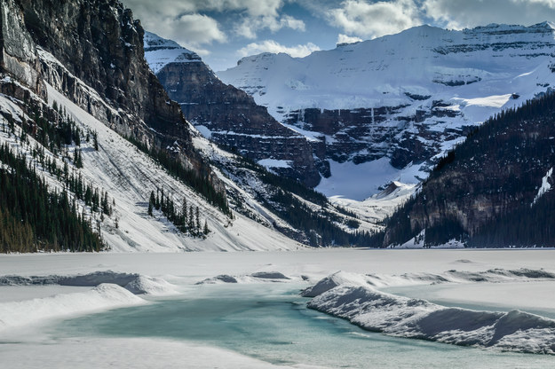 Lake Louise in Alberta's Banff National Park is named after a princess. With her iconic emerald color peeking out from under a white blanket, we'd say she's pretty darn regal in the snow.