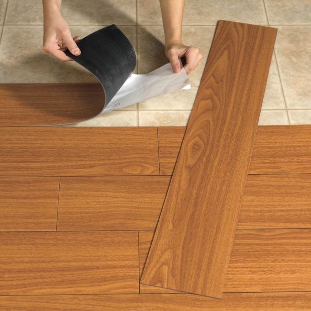 Laminate/vinyl flooring covering an old linoleum floor