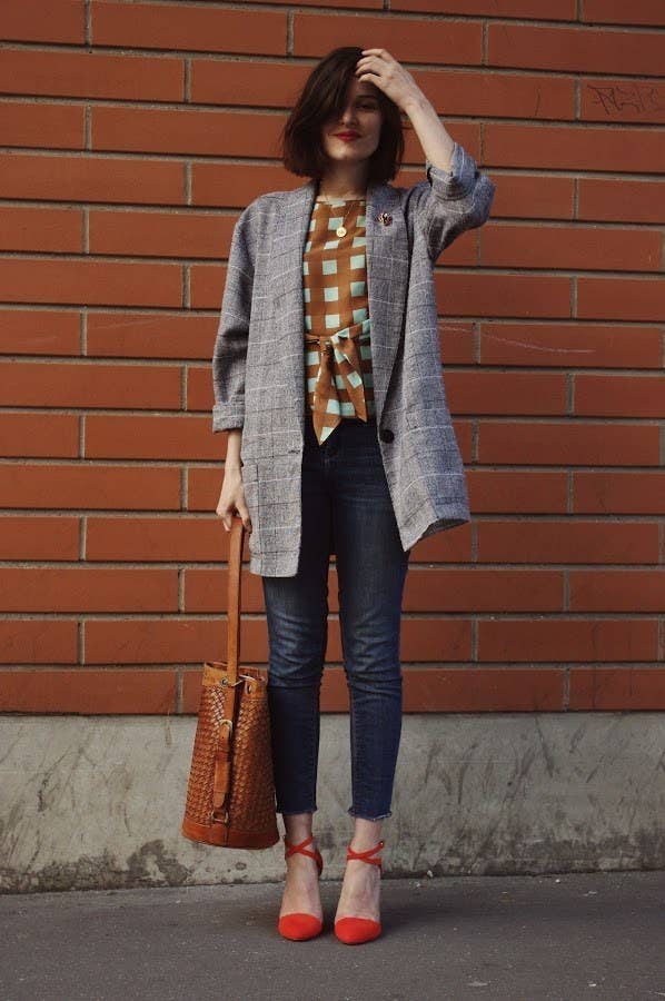 Like a heavy tweed jacket and silk blouse, both with square prints.