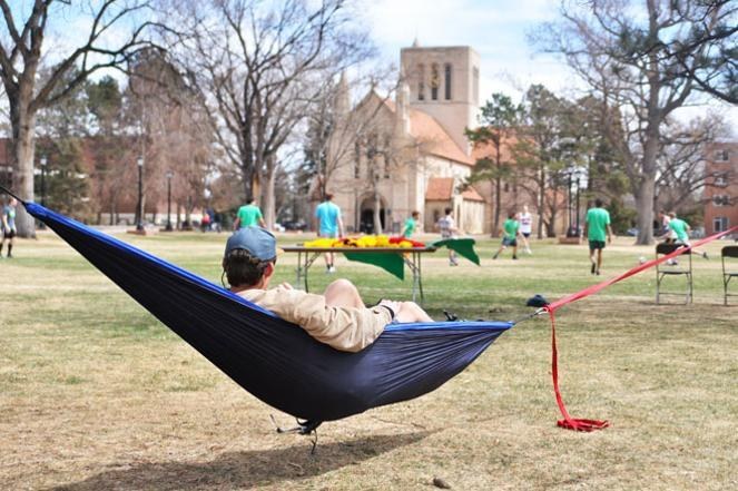 Tie your hammock to a tree and take in an intramural pick-up game. You don't even have to be a student. You can just be like a sedentary, unwanted, possibly dangerous mascot. Keep 'em guessing.