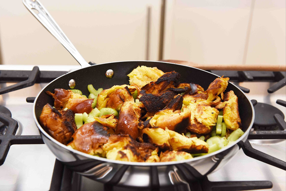Usually when you make stuffing, you sauté the vegetables first so that they're soft. Chef adds the celery to this stuffing later so that it stays a little bit crunchy and adds texture to the poutine.