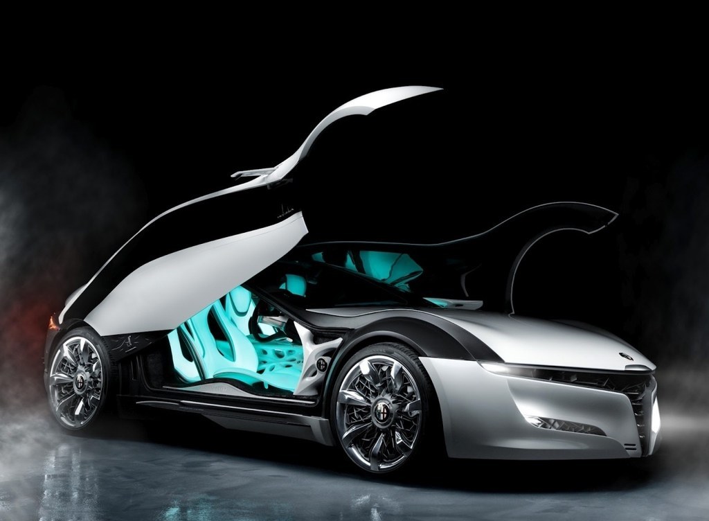 Dark. Mysterious. Alienistic. (Is that a word?) This car looks dangerous; not just to drive, but simply to be around. Loving the new take on the standard scissor doors, incorporating the top of the wheel arches.