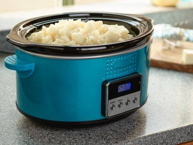 "To keep your spuds warm when every burner of your stovetop is in use, butter your slow-cooker insert, add a little heavy cream and spoon in the potatoes," advises foodnetwork.com. Set the temp to low and remember to give it a stir every 30 minutes.