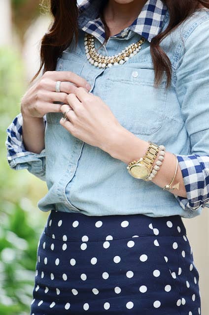 Try a plain white tee, chambray shirt, or trench coat.