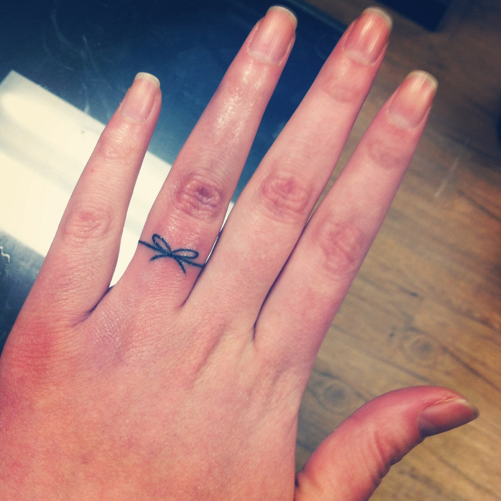 33 Impossibly Sweet Wedding Ring Tattoo Ideas You'll Want To Say "I Do" To