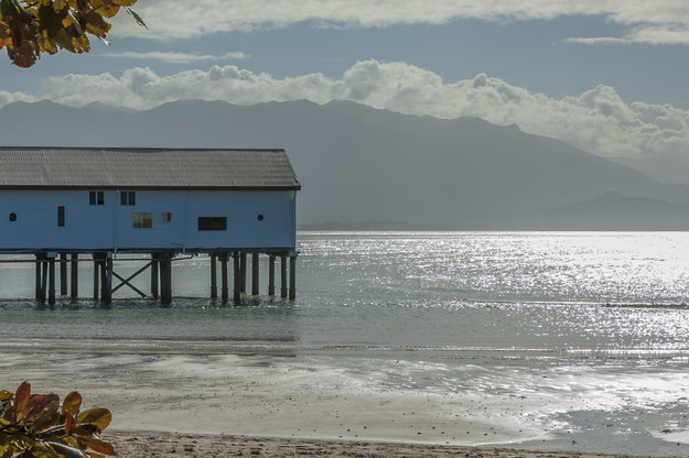 A wharf at Port Douglas extends into the sea.