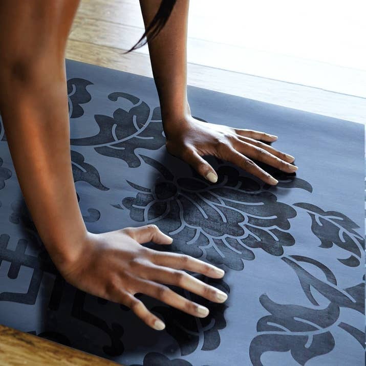 Hot yoga will be less soggy and stinky with a mat that wicks moisture and seals in odor. ($58)