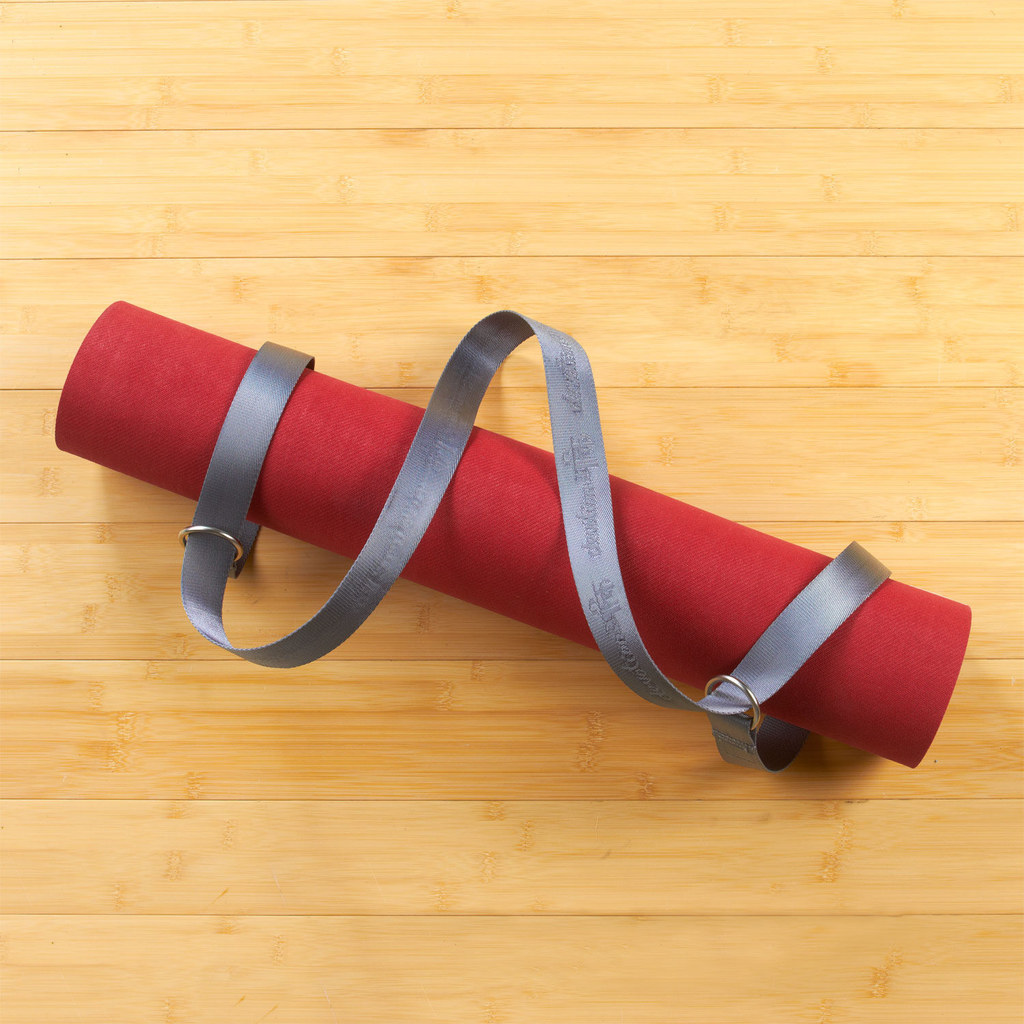 It's time to get off the emotional roller coaster of trying to find a way to conveniently carry a yoga mat or stuff it into your backpack. This lightweight carrier is where it's at. ($9.58)