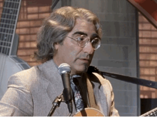 Mitch (Levy) and Mickey's (O'Hara) long-awaited kiss in A Mighty Wind
