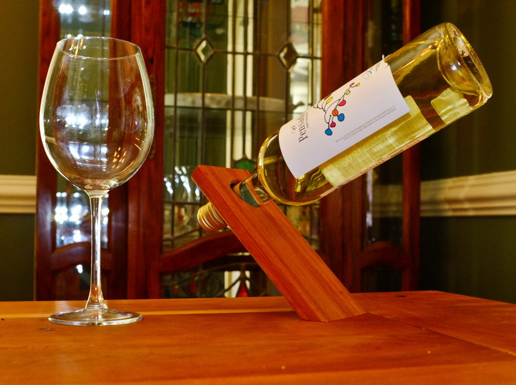 Balancing Wine Bottle Holder from Orange Agate Wood, $9.95
