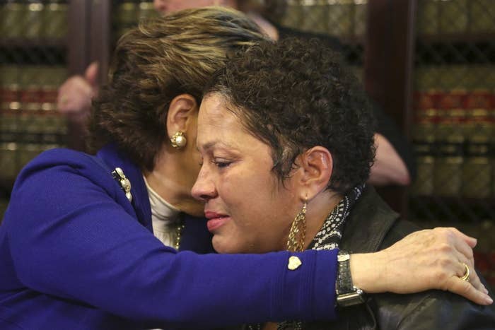Attorney Gloria Allred hugs Chelan at a press conference on Wednesday, Dec. 3.