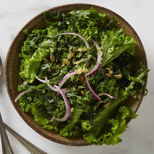 Side Kale and Mustard Greens with Pepitas and Red Onion