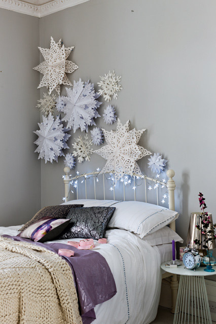 You can create oversized paper snowflakes for a winter wonderland feel.