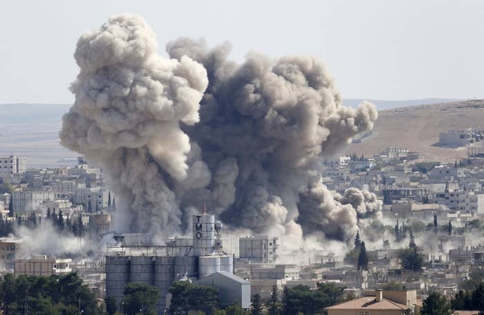 Smoke rises after a U.S.-led air strike in the Syrian town of Kobani.