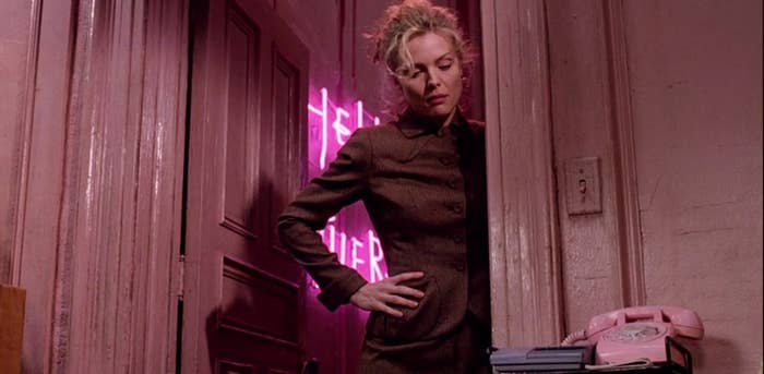 All the pink paint in Selina's apartment, (the walls, the doors, the cabinets), make her transition into Catwoman so much more drastic AND fabulous. And let's not forget that perfect pink phone. Meow!