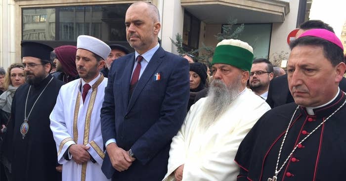 Pictured with Minister Edi Rama (centre) are the leaders of Albania's four biggest religious communities: Orthodox, Muslim, Bektashi and Roman Catholic. The leaders joined a crowd of more than a million for the biggest march in French history.