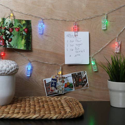 Buy pre-lit clothespin strands, or DIY your own!