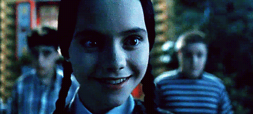 The truth is closer to "I'm so nervous about this that I straight-up forgot how to smile."