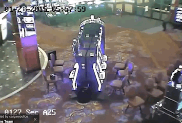 Upon entering they immediately ran for the ATM, knocking over a sign in the process.