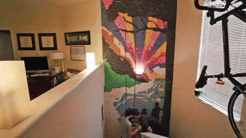 The finished mural took four days to complete and consisted of more than 13,000 1-inch square pieces of colored paper.