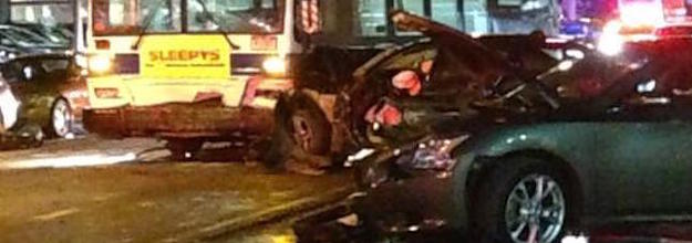 Several cars struck by MTA bus, stacked on top of each other in