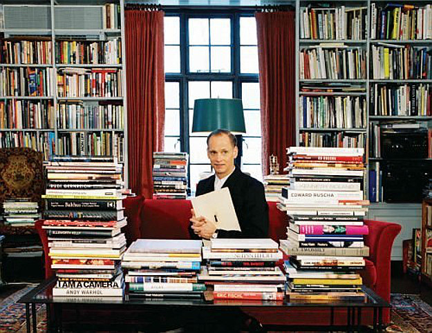 John Waters is pictured above in his home library.John Waters on writing: "I write every day, five days a week in the morning I write something. That’s how I make my living. I’m writing new speeches, journalism, books or something. Every morning, Monday to Friday, eight to 12."