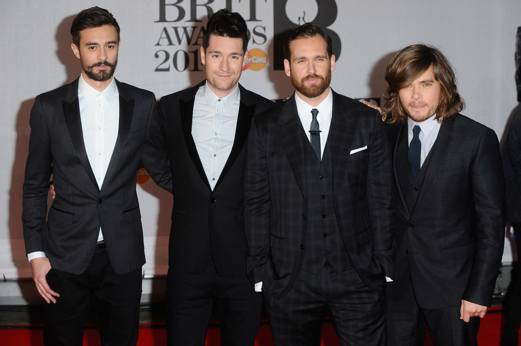 England's Bastille are a band of proud Brits who'd love to take the Grammy back home, much like Sade, Amy Winehouse, and Adele have done in years past. Best known for the rollicking, anthemic sound of "Pompeii," they're big on genre crossing, from featuring rapper Angel Haze on their mixtape to covering '90s house hit "Rhythm of the Night" by Corona in "Of the Night."