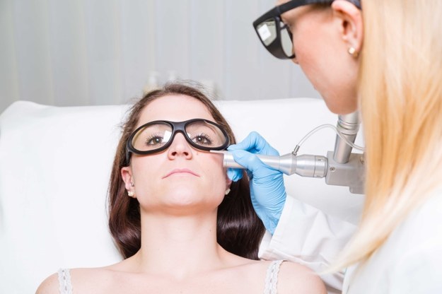 Woman with bags under her eyes, receives treatment from a licensed aesthetician 