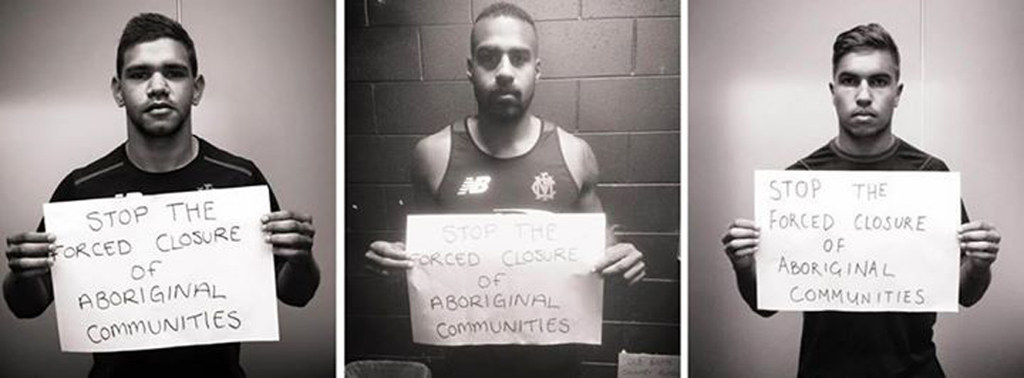 Melbourne Demons players Neville Jetta, Jay Kennedy-Harris and Jeffrey Garlett were among those posing for photos in the #SOSBLAKAUSTRALIA campaign as well as retired Essendon player Nathan-Lovett-Murray.