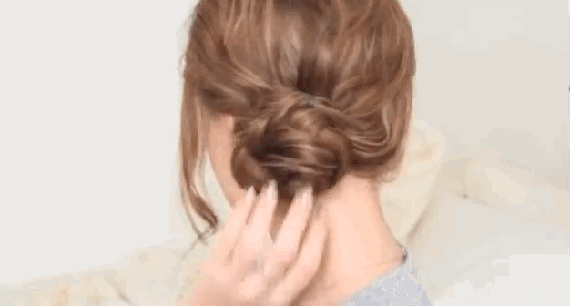 Wrap a side braid around the braid's base (right behind your ear). Secure with bobby pins. Get the tutorial here.