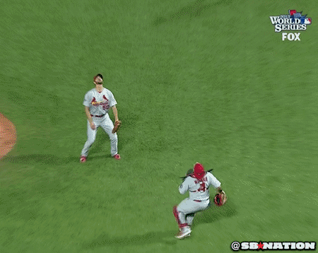 GIF: Wainwright, Molina let pop up fall between them 