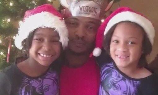 Brisbon with his daughters