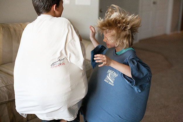 Use some pillows and a pair of dad-size T-shirts to "sumo wrestle."