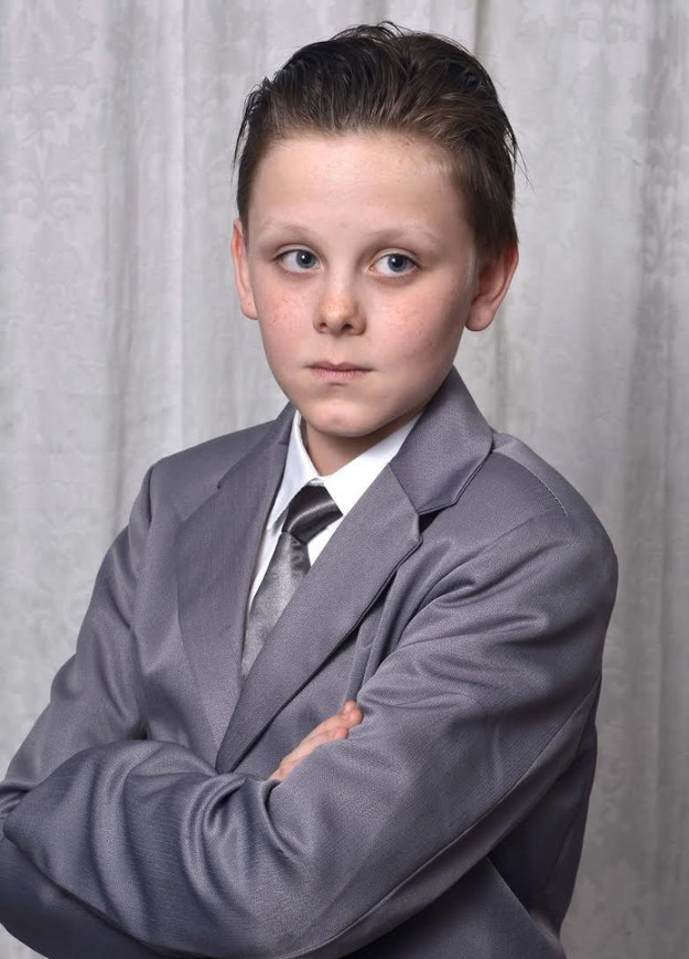 child dress up as teacher