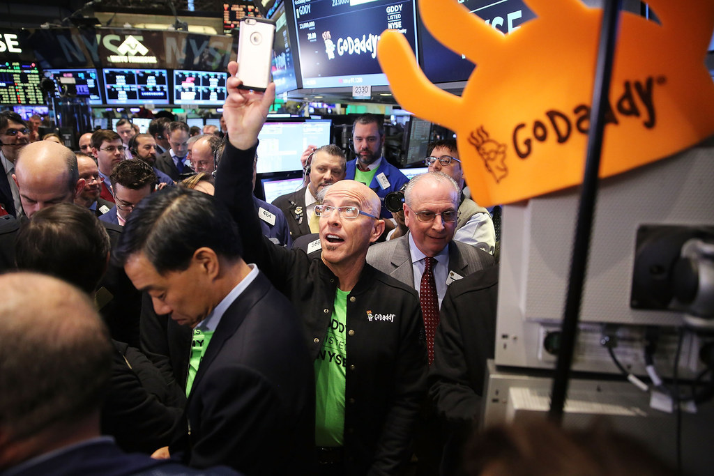 GoDaddy CEO Blake Irving visits on the floor of the New York Stock Exchange as the website hosting service makes its initial public offering (IPO) on April 1, 2015, in New York City.