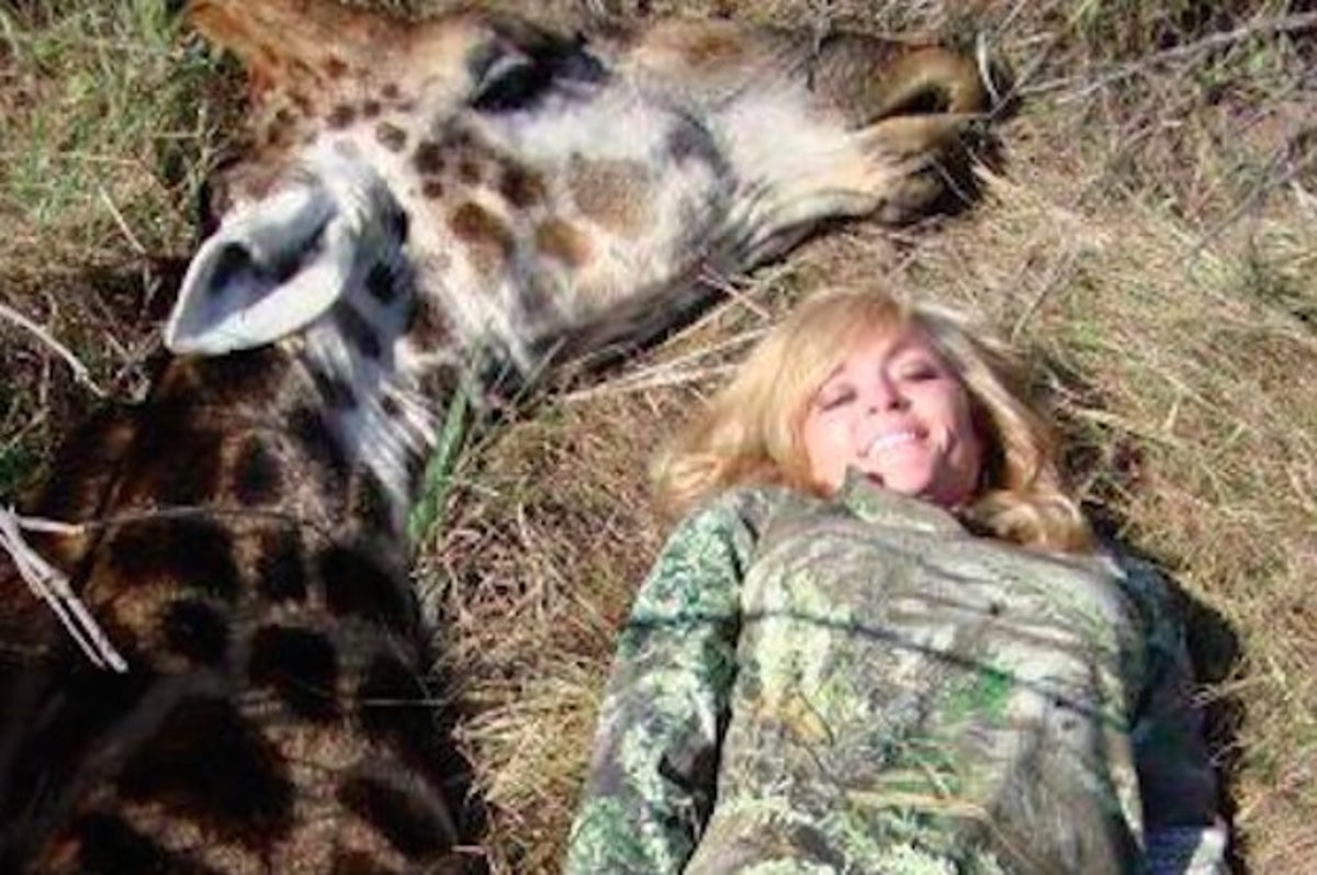 A Hunter Is Getting Death Threats For Her Photo With A Dead Giraffe