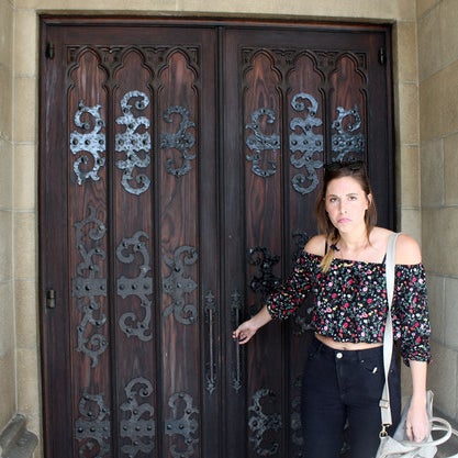 Lara, locked out of the church.