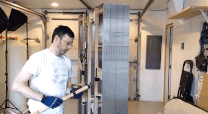 According to the video description: "The replica uses two iPads as computer readouts, and features a camera/monitor system to allow me to see in front of it. It also has an audio system, allowing me to talk to people or play sound effects."