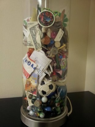 This Canadian mother had a bright idea: save all the stuff found in her son's pockets before tossing the clothes in the wash. At his wedding, she gave him a lamp containing all the treasures from his childhood.