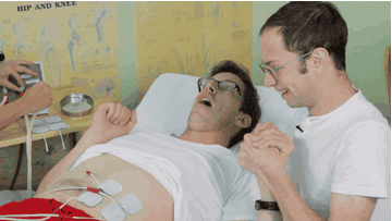 Michigan men try labor pain simulator